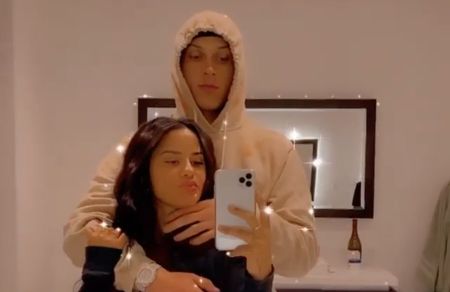 Tyler Herro and his girlfriend Katya Henry poses for a picture.